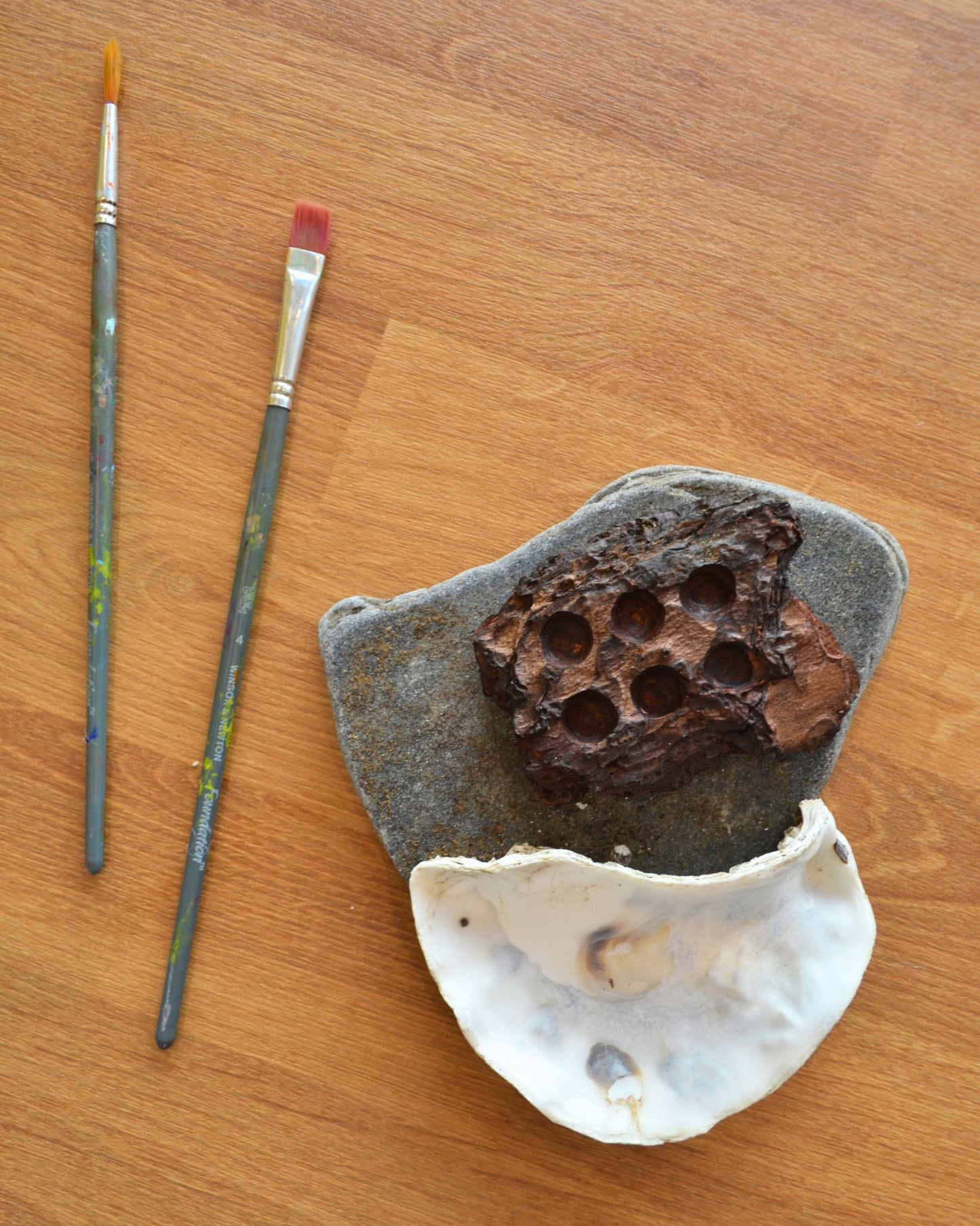 watercolour palette made from oyster shell, wood, and slate