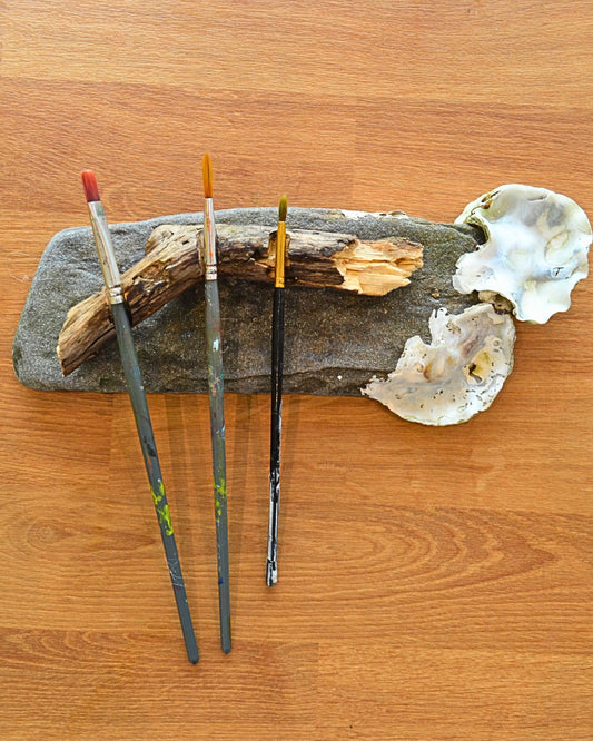 brush rest and mixing palette made from oysters, slate rock and driftwood